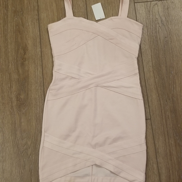 Dresses & Skirts - Light pink bandage style mini dress